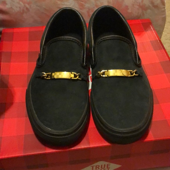 Black suede vans with gold buckle
